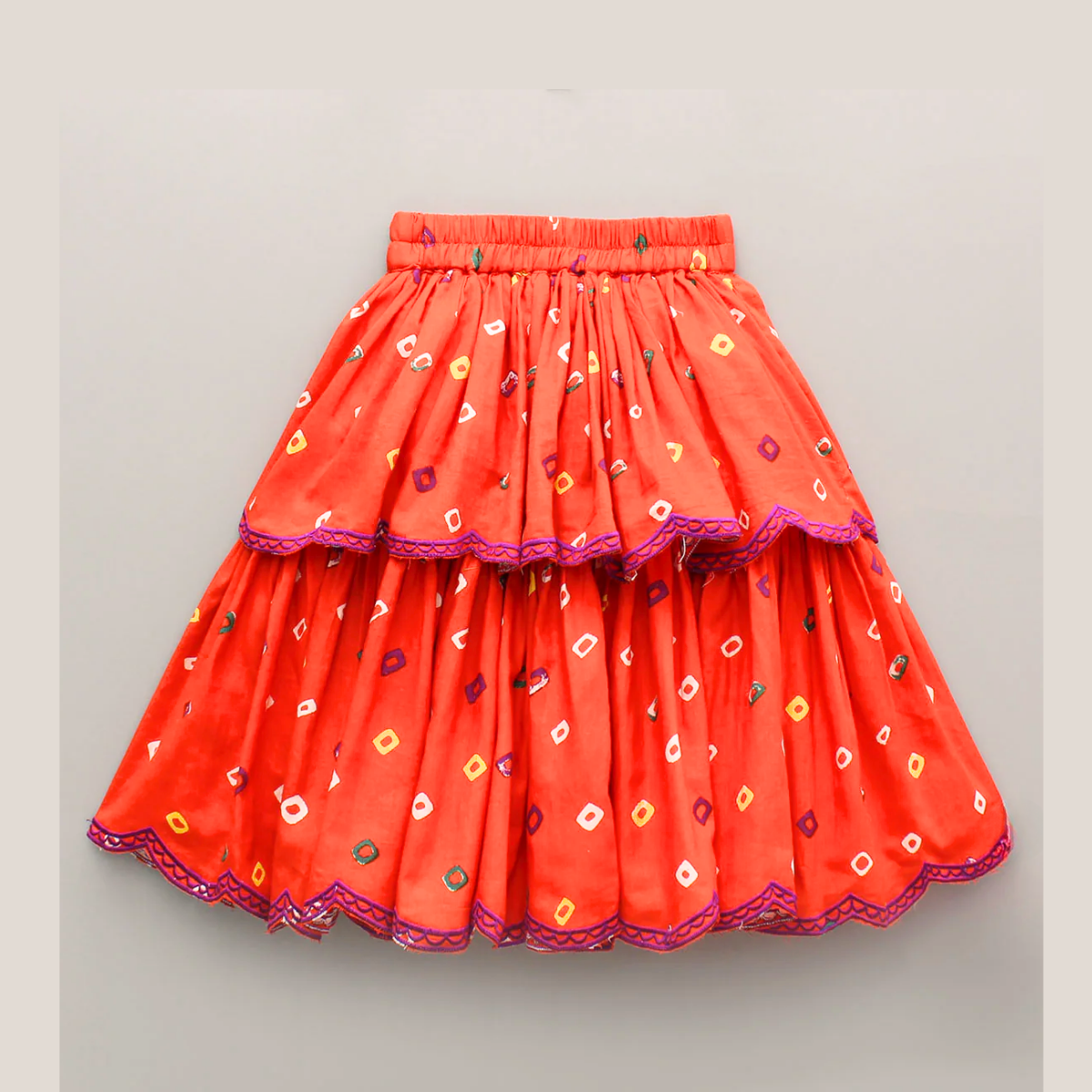 Orange Embroidered Orange bandhani V neck Top and layered skirt