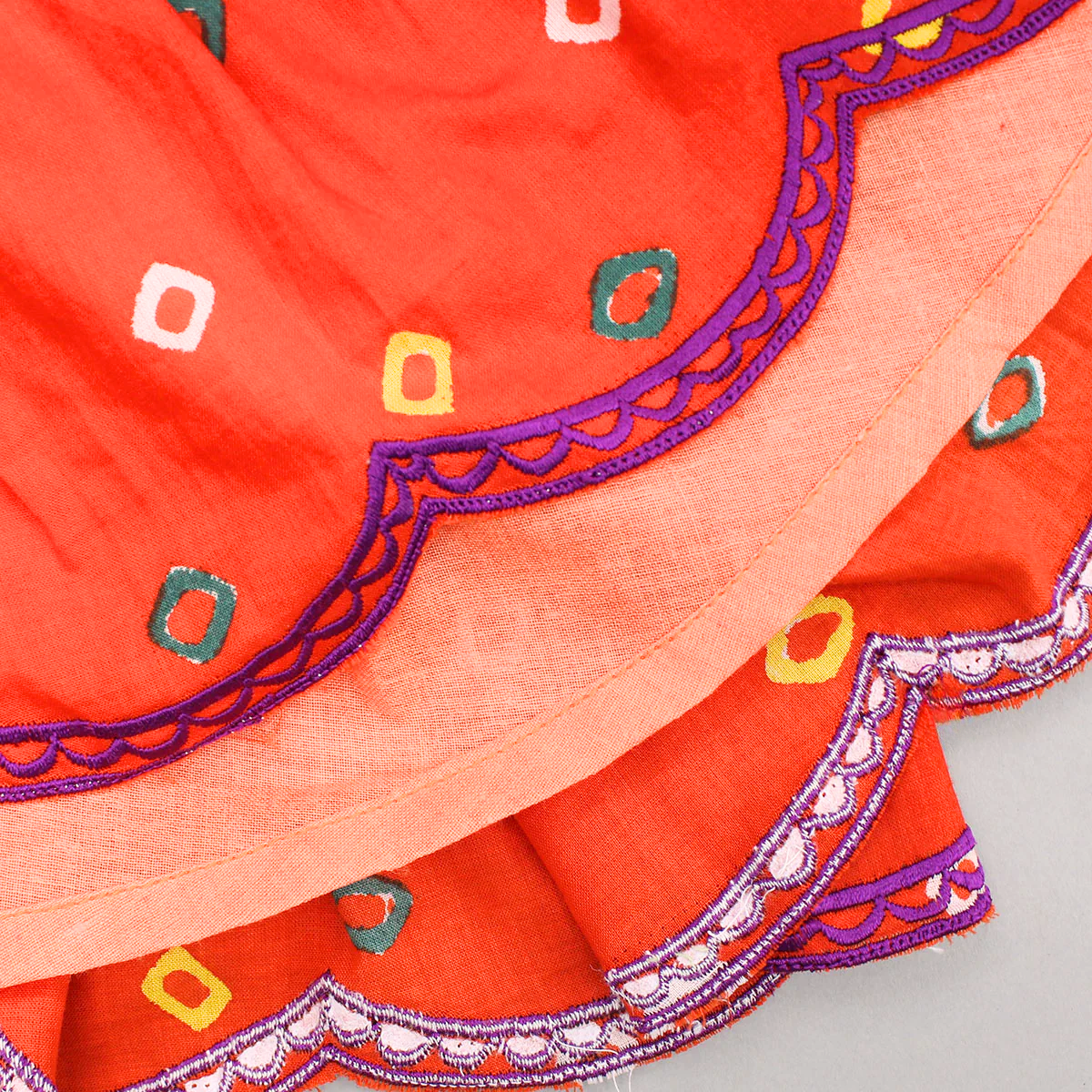 Orange Embroidered Orange bandhani V neck Top and layered skirt