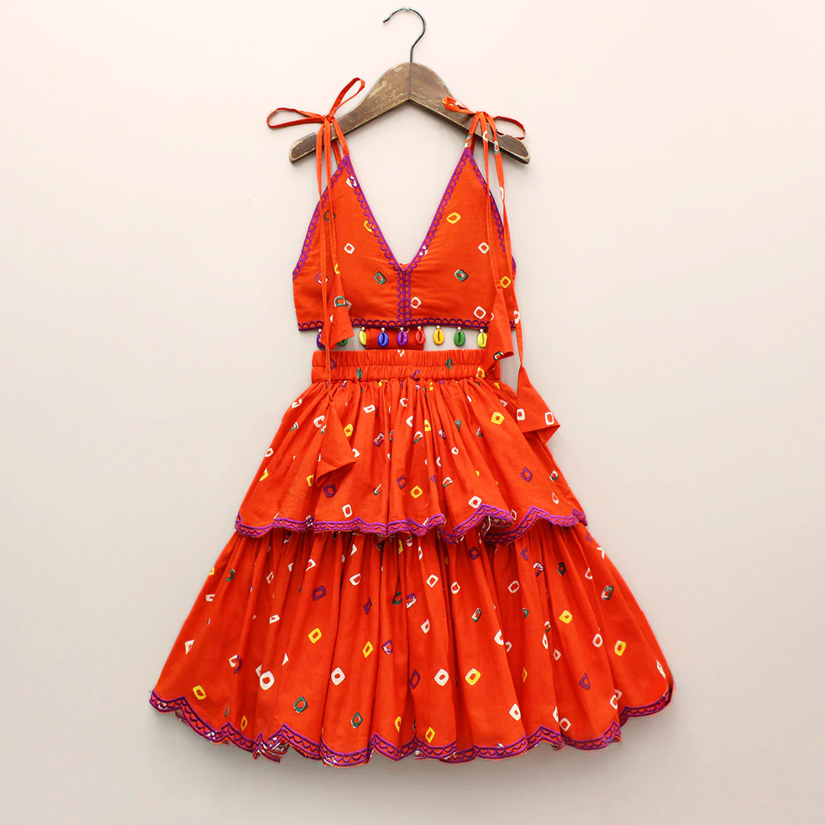 Orange Embroidered Orange bandhani V neck Top and layered skirt