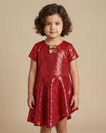 Load image into Gallery viewer, Girl wearing red poly sequin party dress with bow detail