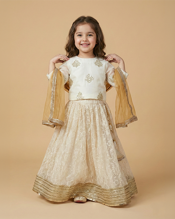Ivory & gold jute silk lehenga set for girls with organza dupatta