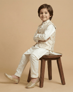 Load image into Gallery viewer, Off-White Chanderi Silk Kurta with Brocade Bandi and Pyjama Set for Boys. - BYB PREMIUM