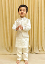 Load image into Gallery viewer, Off-White Chanderi Silk Kurta with Brocade Bandi and Pyjama Set for Boys. - BYB PREMIUM