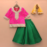 Girls pink taffeta silk embroidered lehenga set with green skirt and yellow dupatta