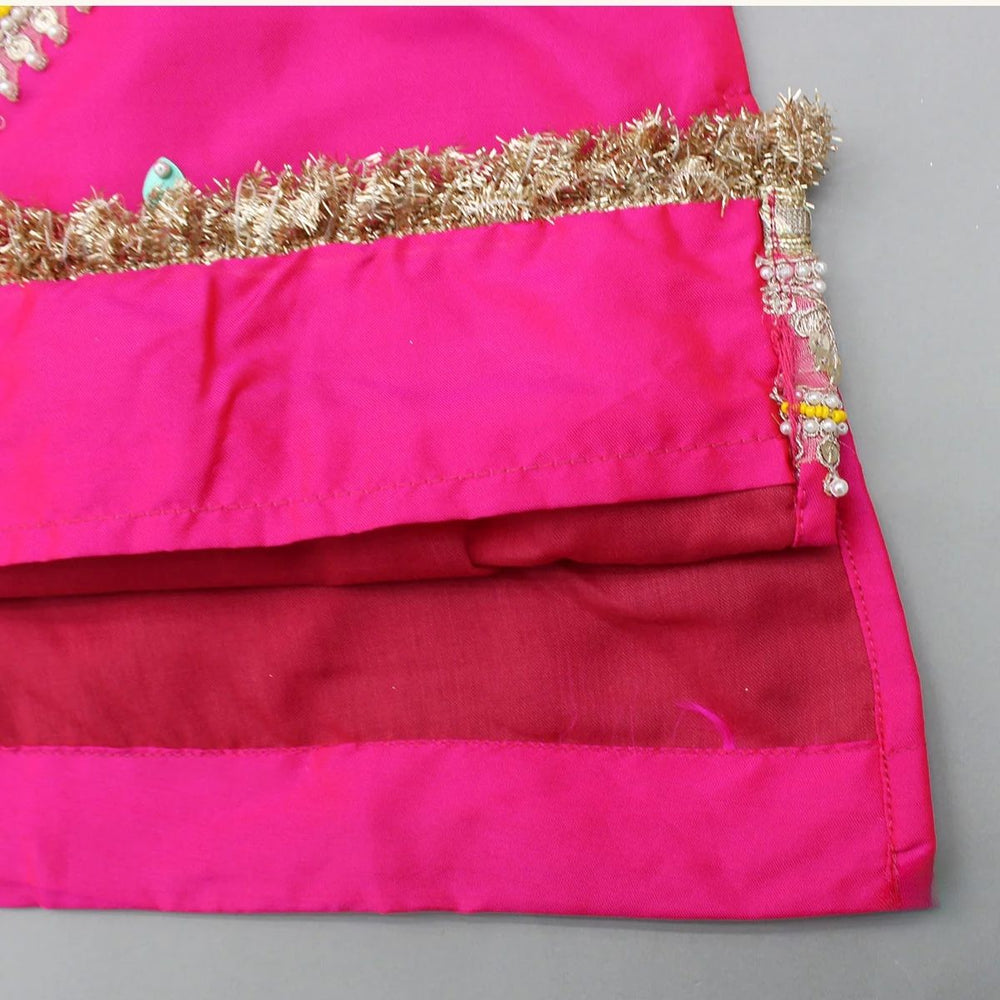 Girls pink taffeta silk embroidered lehenga set with green skirt and yellow dupatta