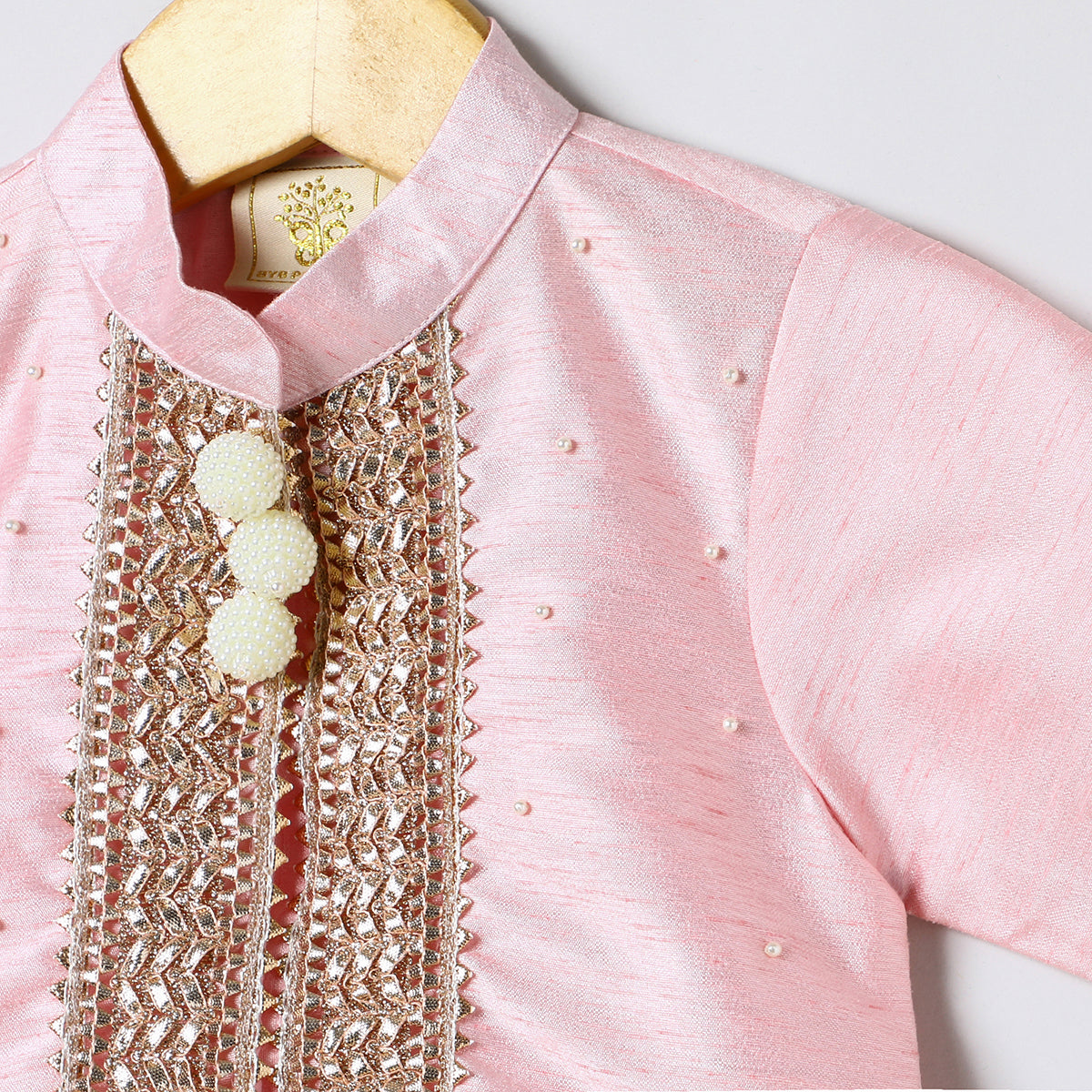 Baby pink raw silk goat work anarkali skirt and top set