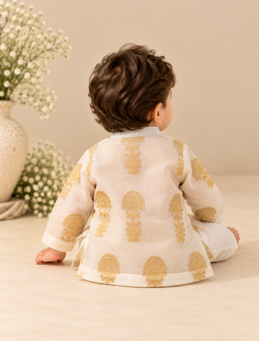 Boys cream pure cotton jacquard kurta set with golden embroidered motifs, pearl buttons and matching trousers.