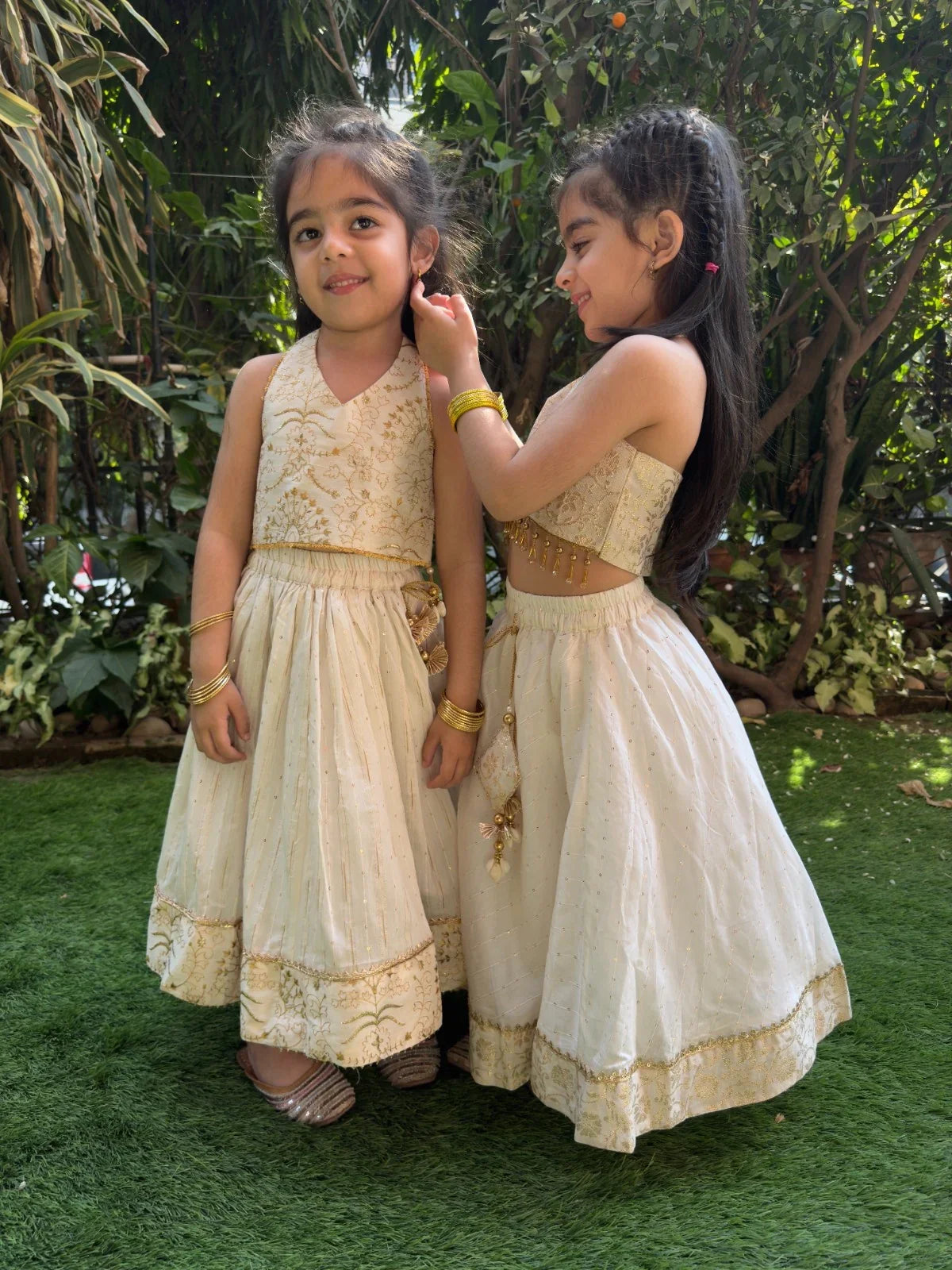 Off white halter brocade embellished top and skirt set