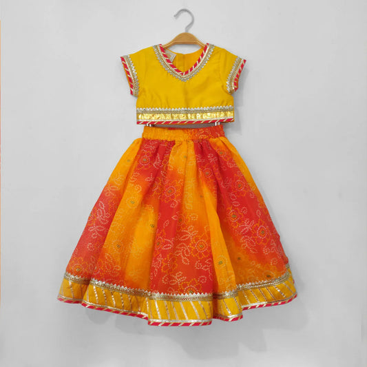 Girls Yellow Silk Top & Bandhani Lehenga Set