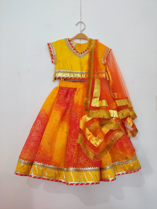 Girls Yellow Silk Top & Bandhani Lehenga Set