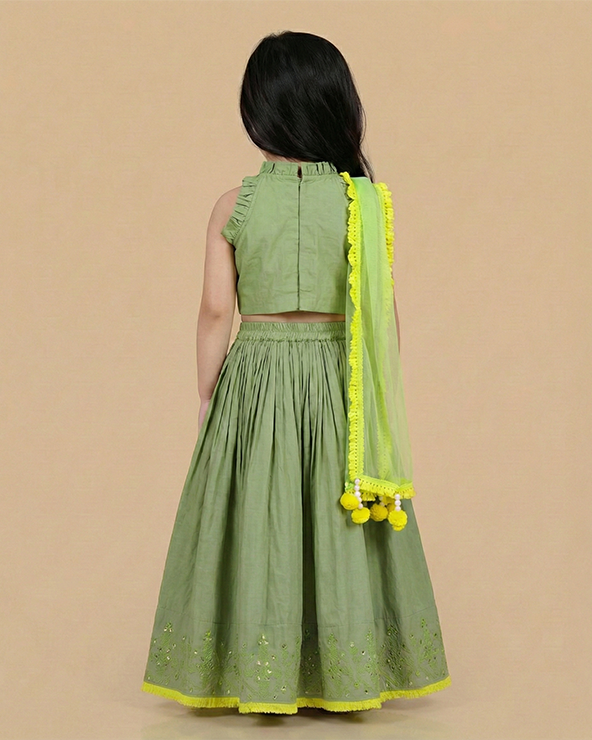 Sage green chanderi lehenga set for girls with mirror work & dupatta