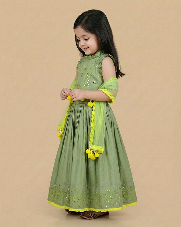 Sage green chanderi lehenga set for girls with mirror work & dupatta