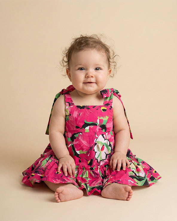 Bright floral print paper poplin baby dress with vibrant all over design