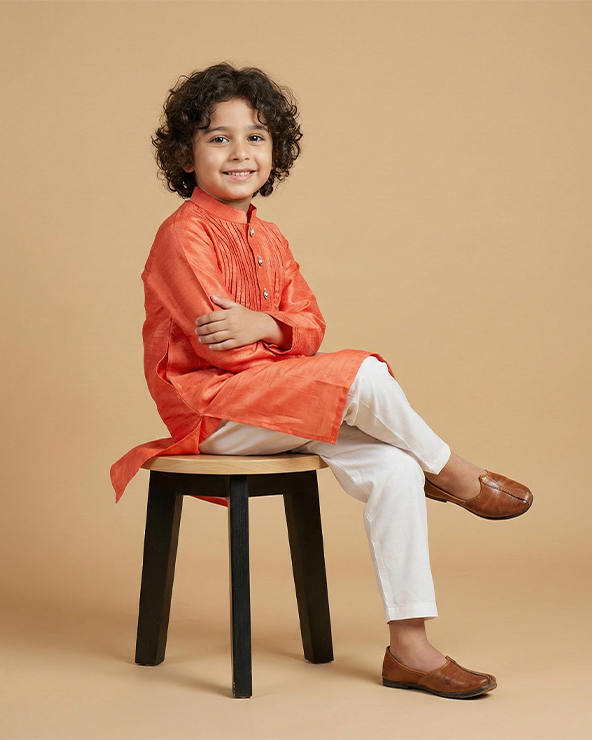 Bright peach tissue kurta & off white cotton pyjama set for boys