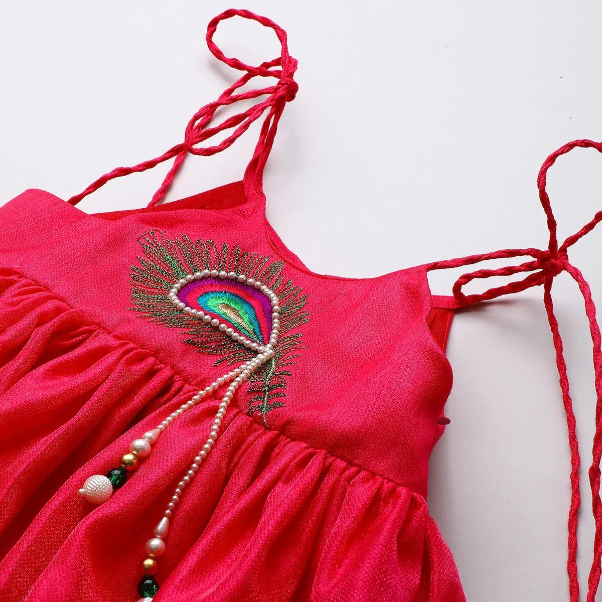 Fuchsia pink tissue silk mayurpankh embroidered top with green taffeta dhoti   byb premium