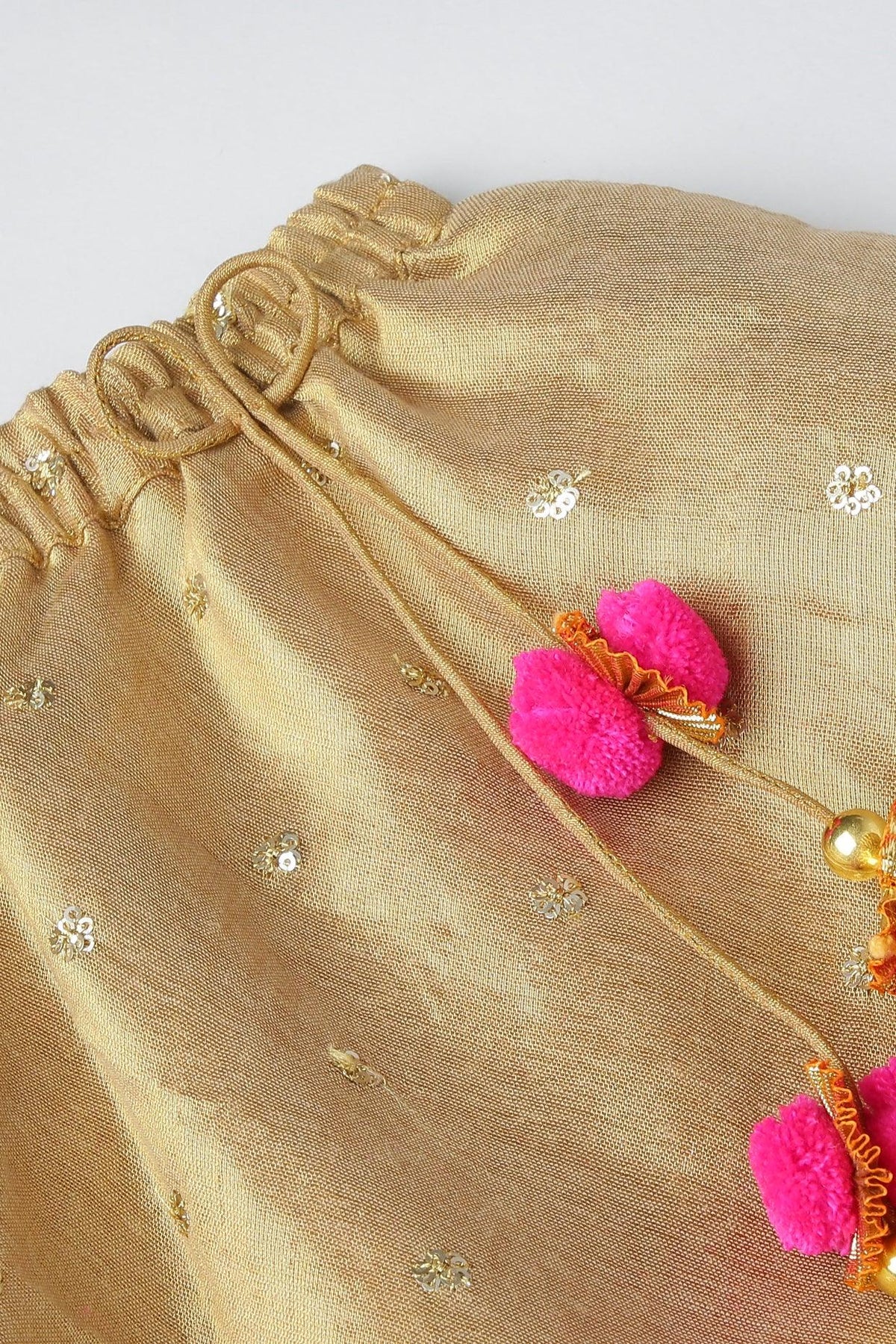 Golden lehenga set with hot pink border   byb premium