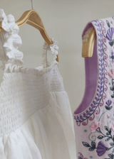 Off-White Mul Mul Cotton Dress with Lavender Linen Embroidered Shrug for Baby Girls - BYB PREMIUM