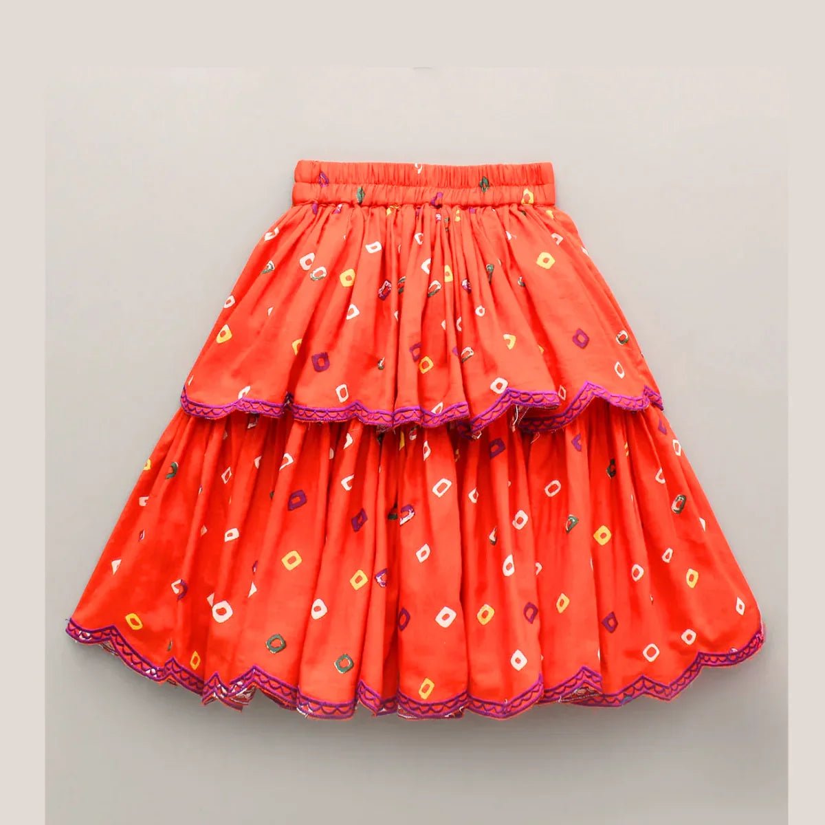 Orange bandhani embroidered v neck top with layered lehenga skirt for girls   byb premium
