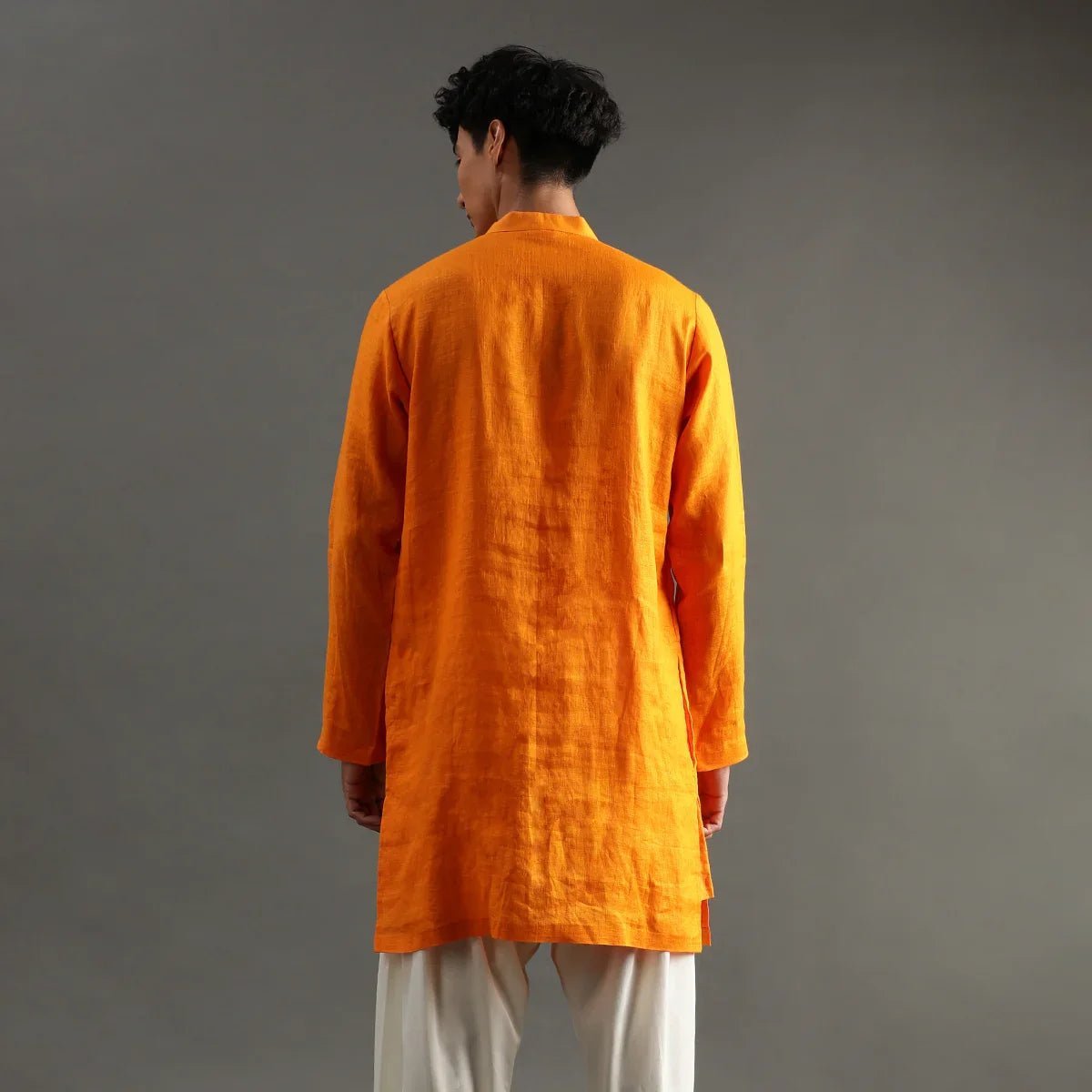 Orange linen kurta set with hand embroidery   byb premium