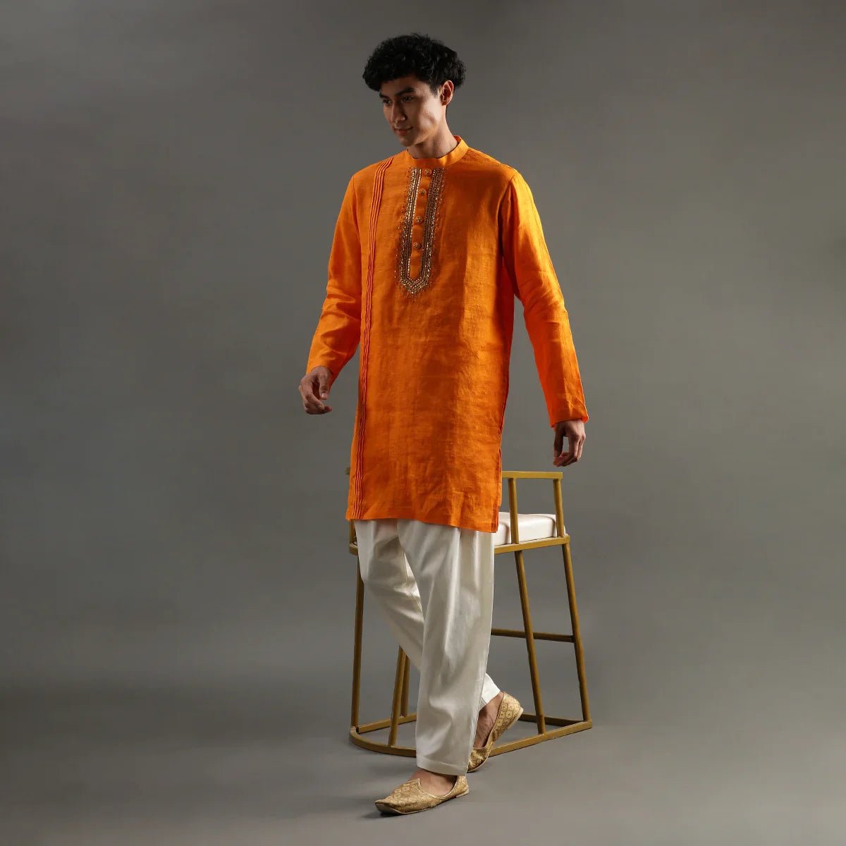 Orange linen kurta set with hand embroidery   byb premium