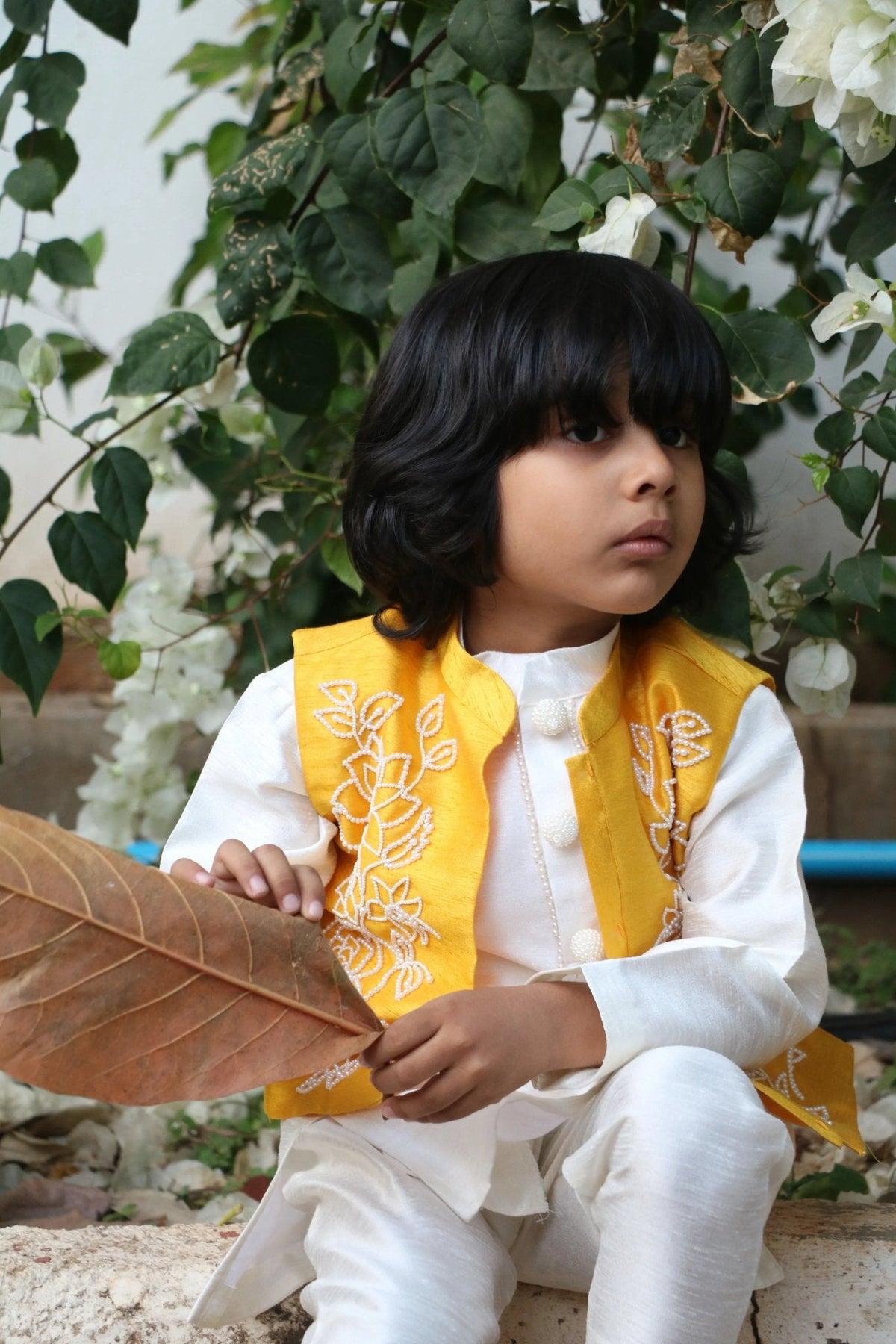 White kurta pyjama set with yellow raw silk embroidered jacket for boys   byb premium