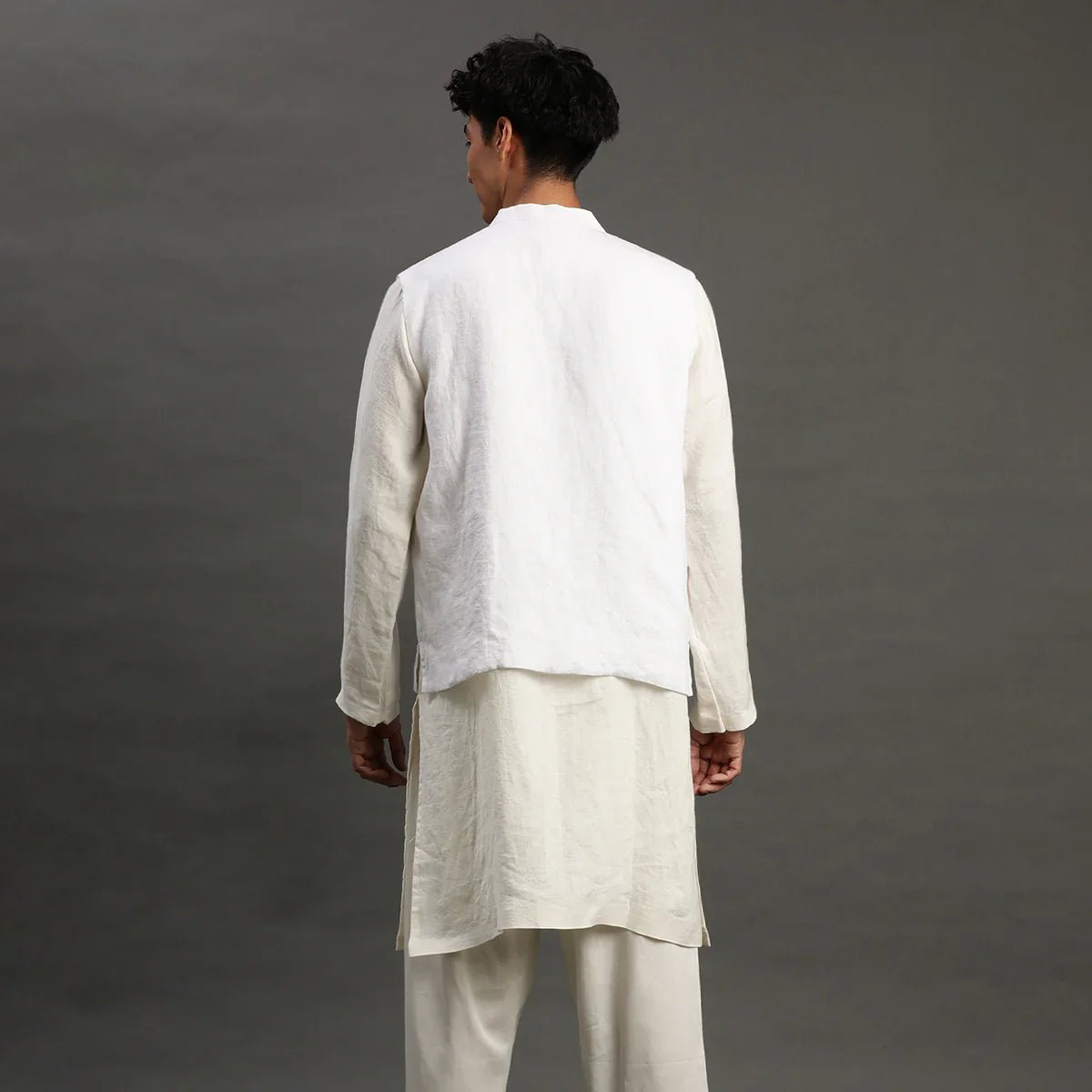 White linen kurta set with embroidered jacket   byb premium