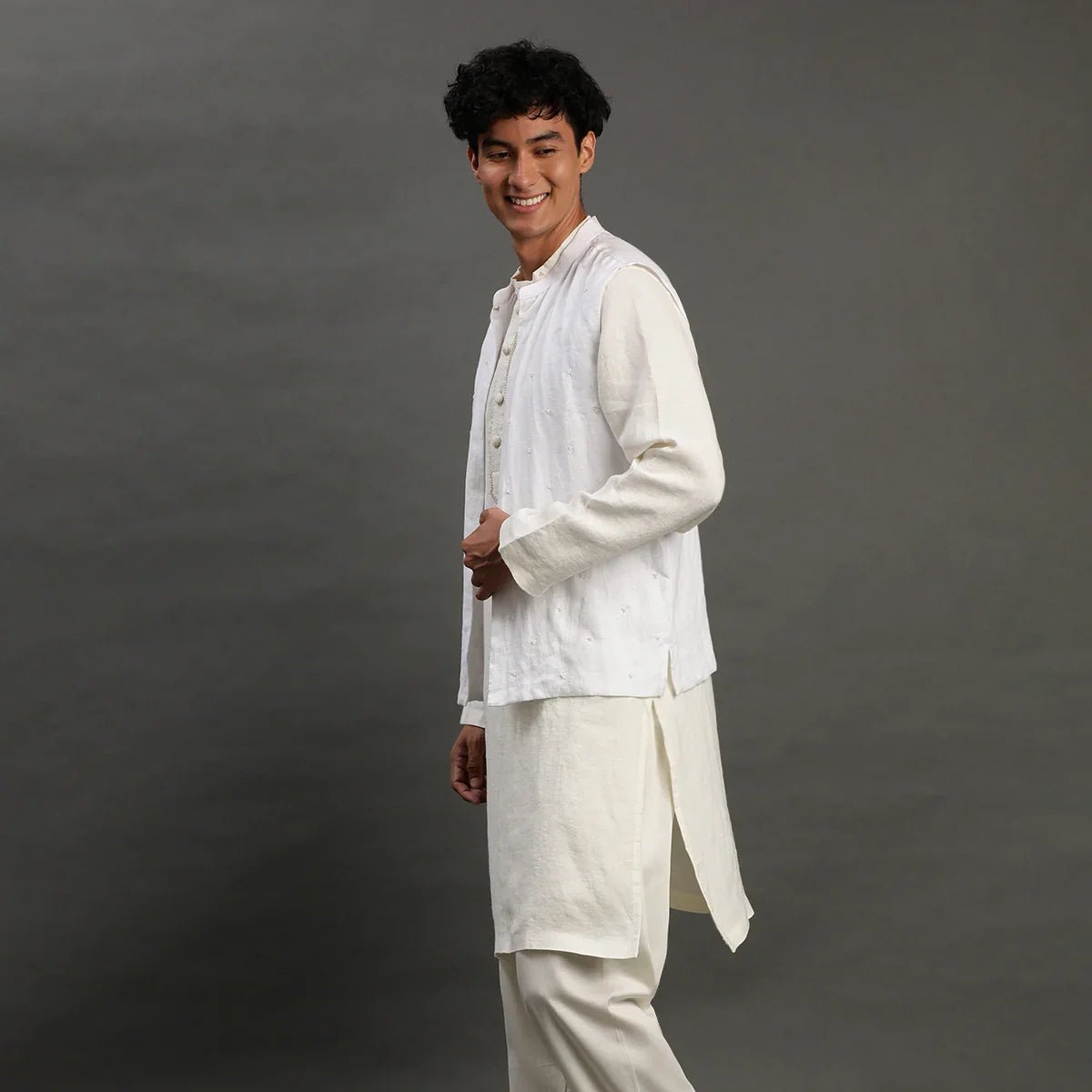 White linen kurta set with embroidered jacket   byb premium