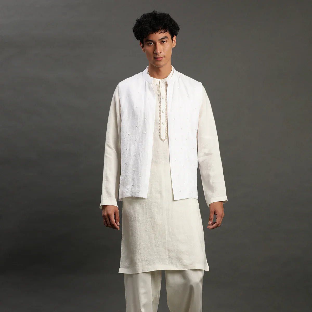 White linen kurta set with embroidered jacket   byb premium