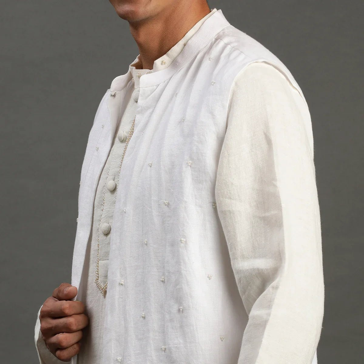 White linen kurta set with embroidered jacket   byb premium