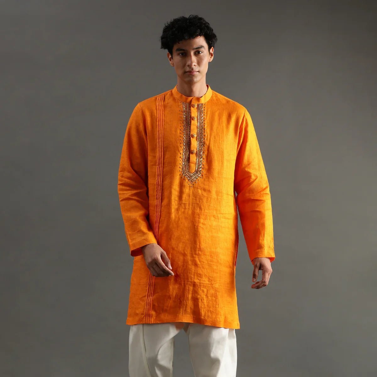 Orange linen kurta set with hand embroidery   byb premium